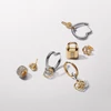 Kép 4/5 - Pandora kéttónusú Mostohaanya összefonódott szívek charm- 763244C00