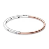 Kép 1/3 - Pandora logó ezüst és 14k rózsaaranyozott karperec cirkóniával 17,5 cm - 582740C01-1