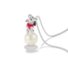 Kép 2/3 - Thomas Sabo Peanuts Snoopy gyöngy szívvel medál - PE991-664-14